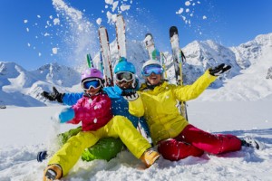 Ski, winter, snow and fun - family enjoying winter